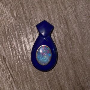 Milky, Fire Opal set in Blue Lapis pendant